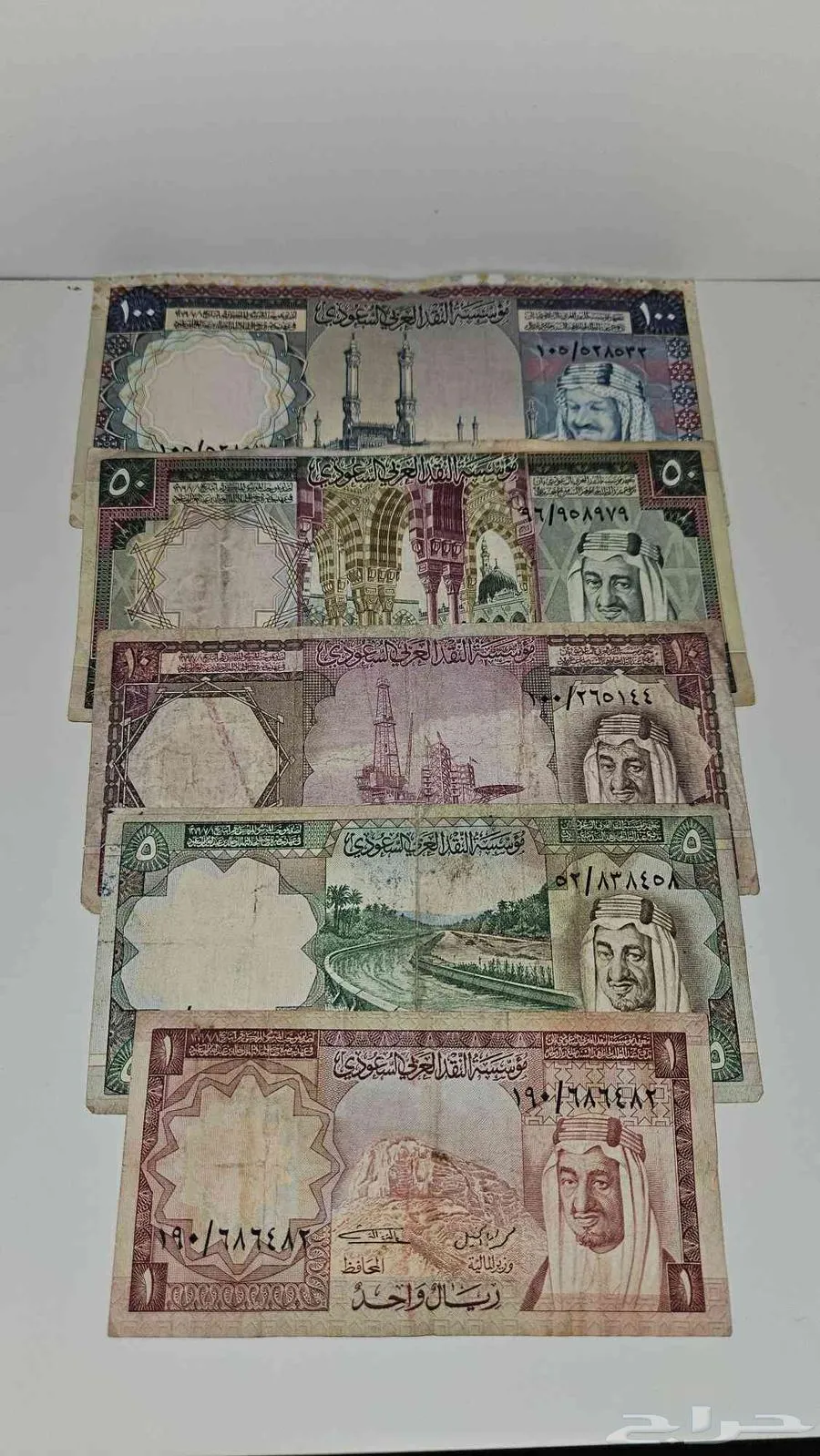 عملات سعودية قديمة من عهد الملك خالد 1977 - معروضة للبيع لدى تراثيات في الرياض