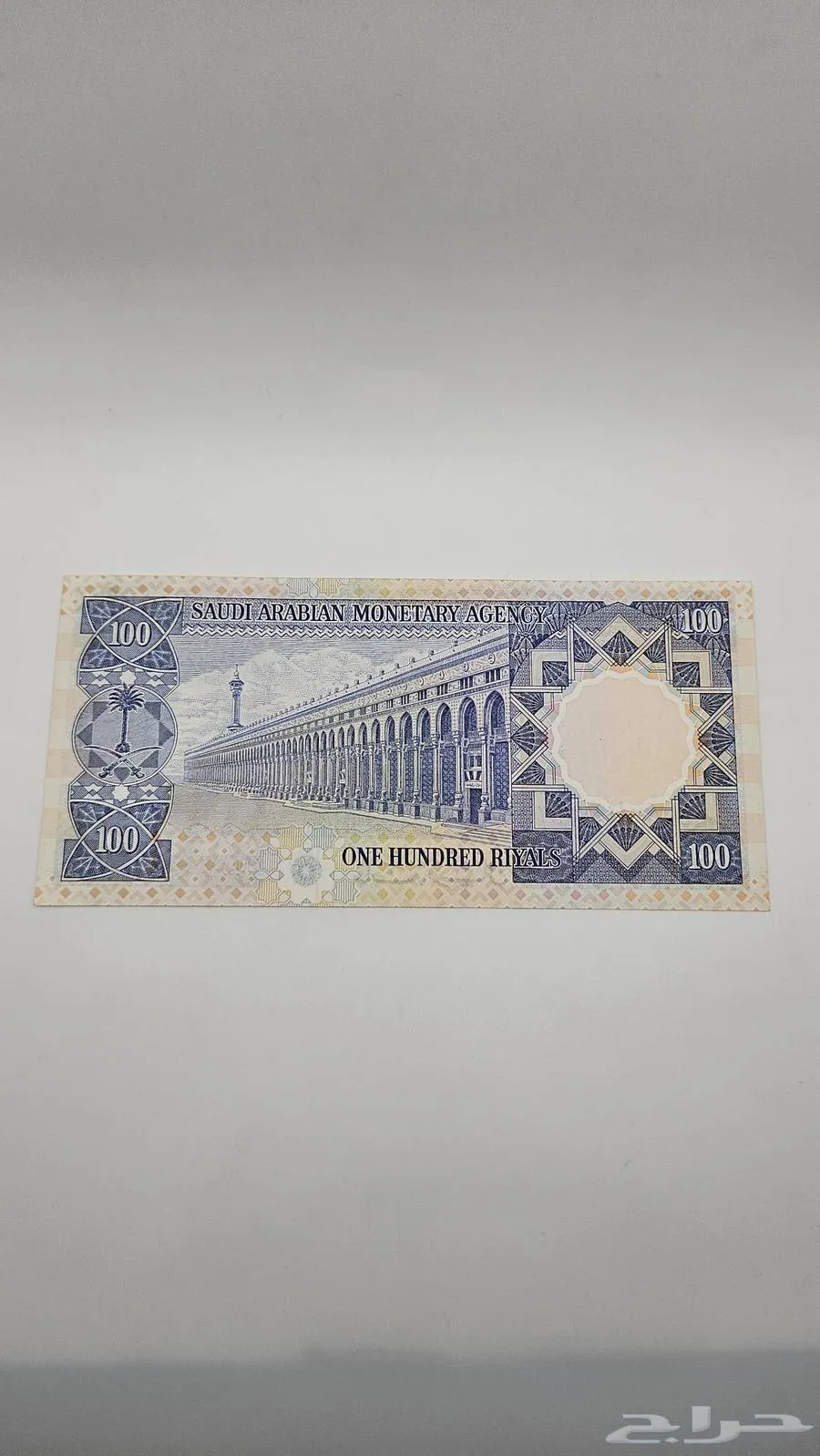 عملة سعودية 100 ريال الملك خالد (انسر) - صورة 2 - معروضة للبيع لدى تراثيات في الرياض